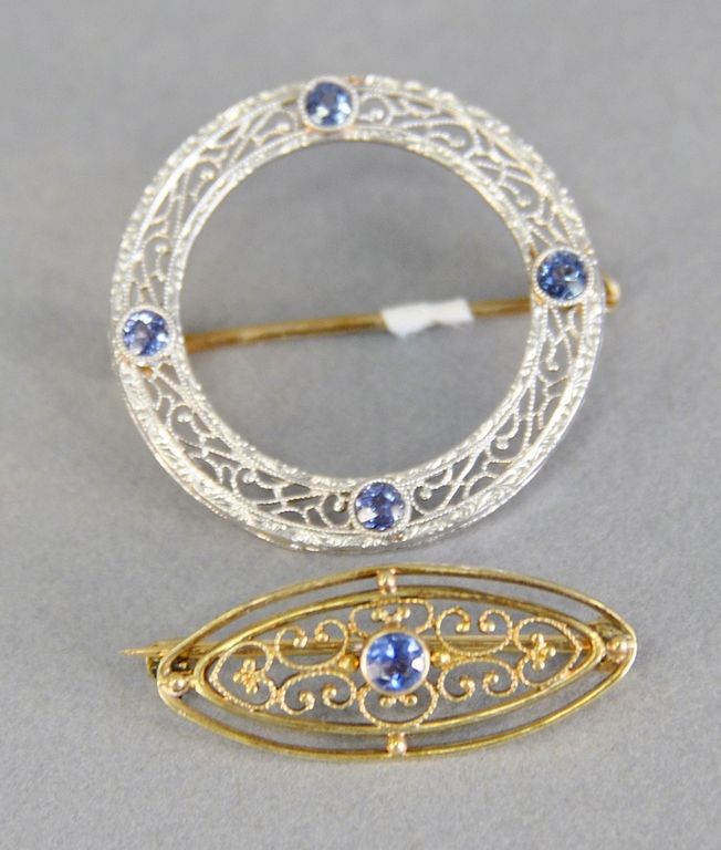 Appraisal: Two pins one platinum and gold circle with sapphires and