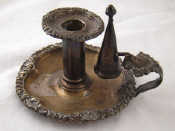 Appraisal: A silver chamber candlestick with ejector and extinguisher by Matthew