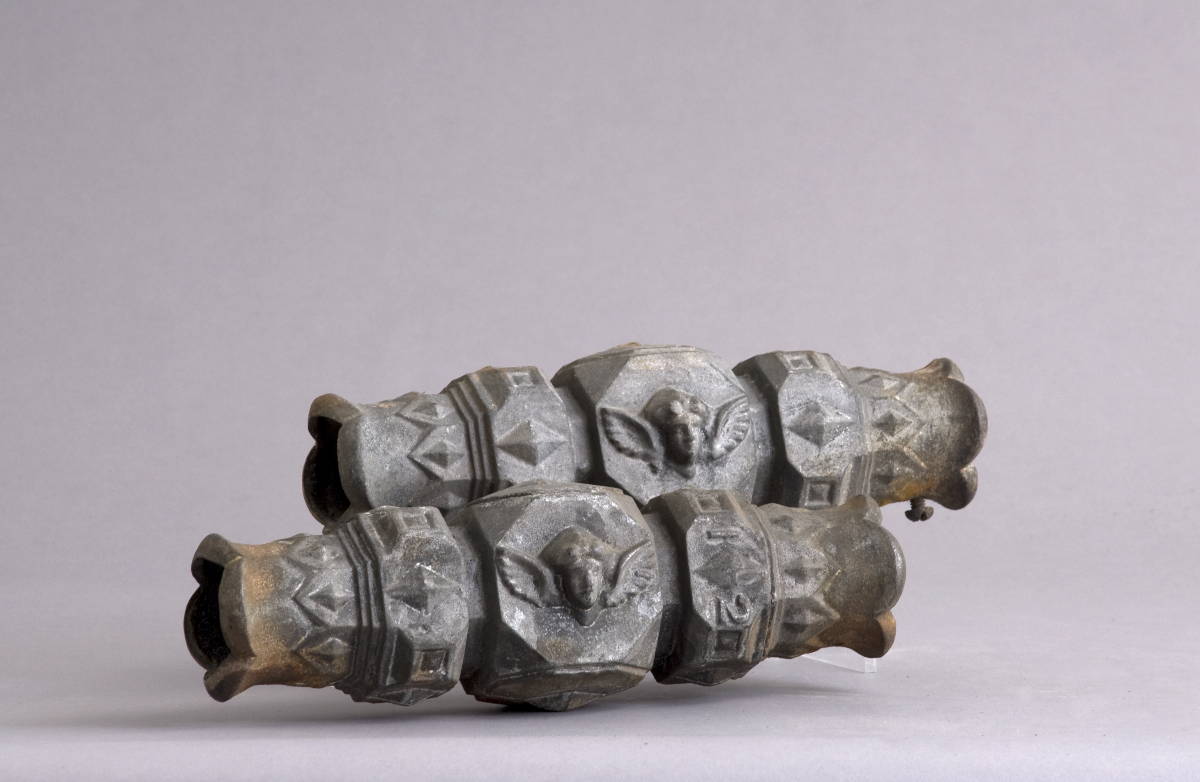 Appraisal: PAIR OF DECORATIVE CAST-ZINC FITTINGS WITH ANGEL HEADS Length inches