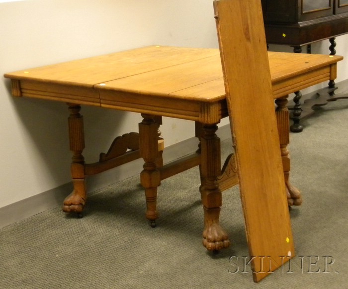 Appraisal: Late Victorian Carved Oak Dining Table with Paw Feet including