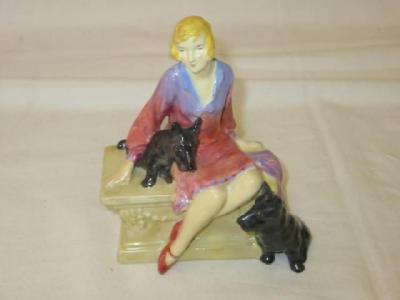 Appraisal: A ROYAL DOULTON FIGURE The Scotties HN modelled as an