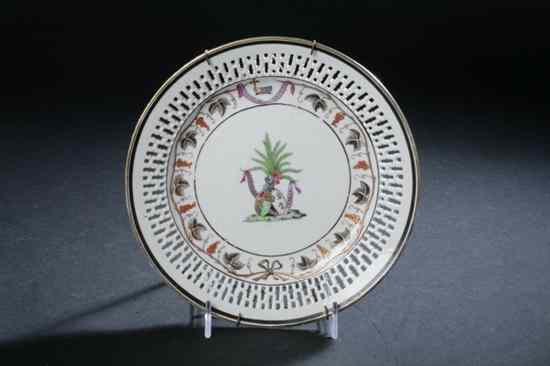 Appraisal: CHINESE ARMORIAL FAMILLE ROSE RETICULATED PLATE Qianlong period circa The