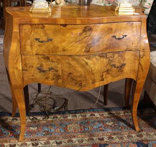 Appraisal: Italian Rococo style olive wood chest having a serpentine top