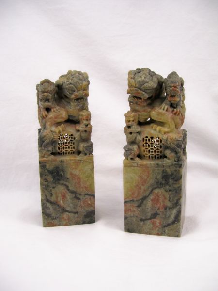 Appraisal: Pr Foo Dog Soapstone Bookends Mottled soapstone bookends depict a