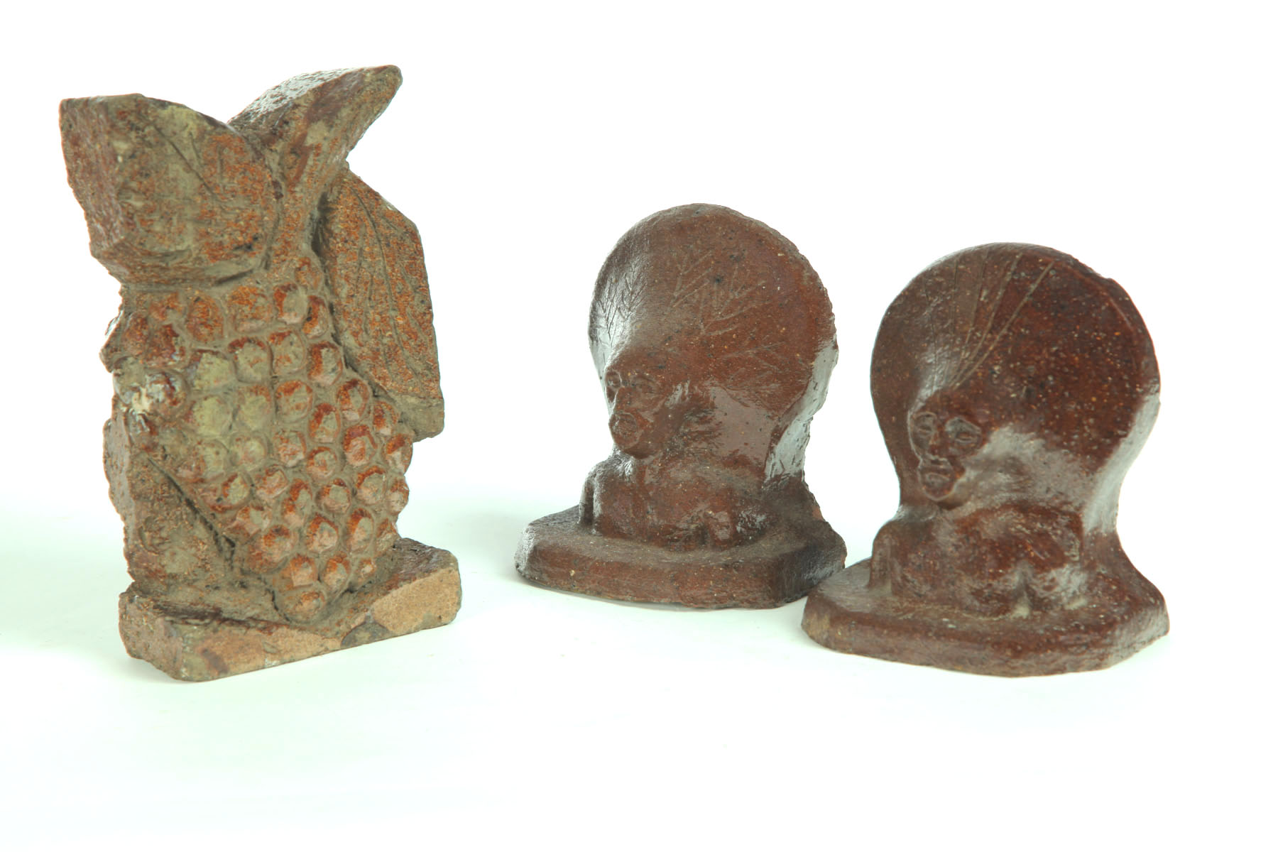 Appraisal: THREE PIECES OF SEWERTILE American early th century Bookend with