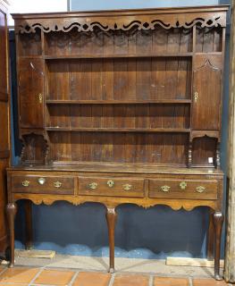 Appraisal: Welsh walnut cupboard Welsh walnut cupboard second quarter th century