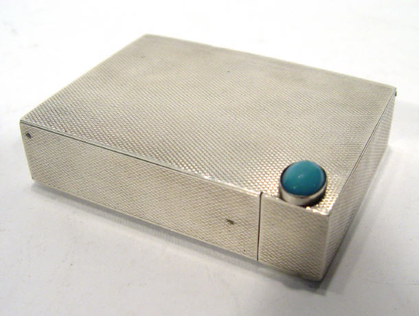 Appraisal: Rectangular grade silver compact with engine turned exterior the interior