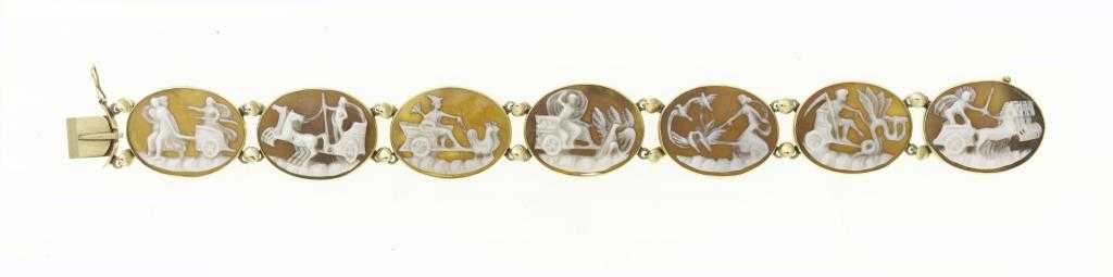 Appraisal: A CAMEO BRACELET with seven oval shell cameos carved with