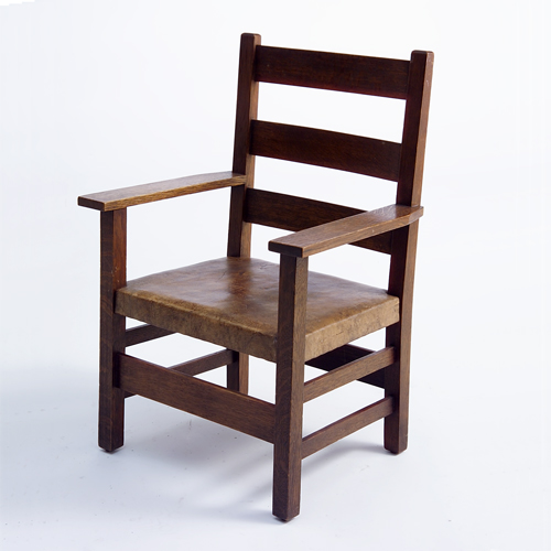 Appraisal: GUSTAV STICKLEY Child's armchair with three horizontal backslats and tacked-on