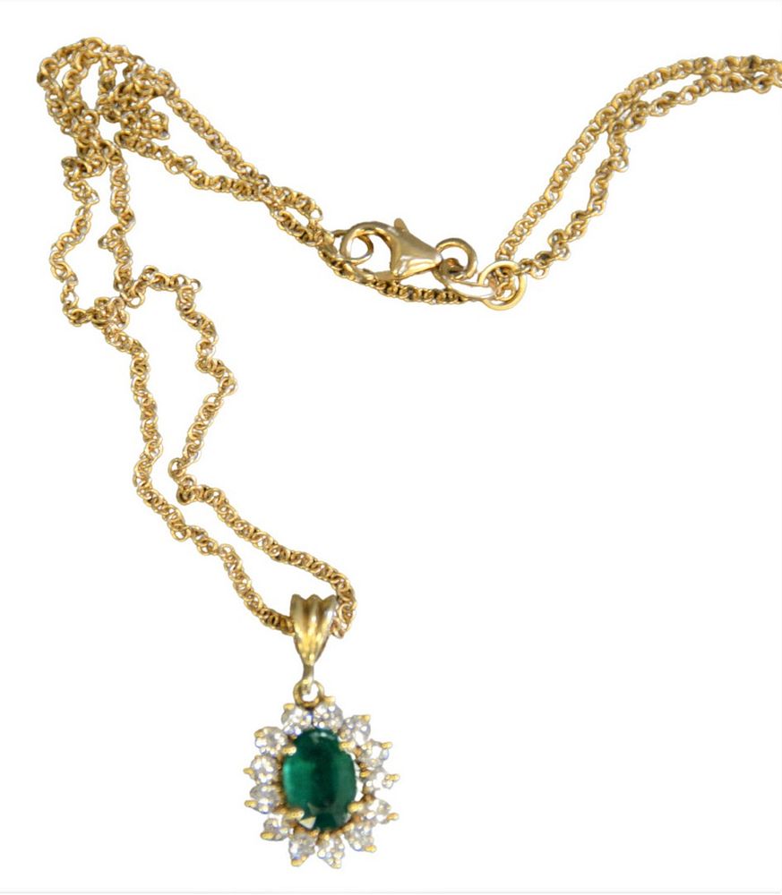 Appraisal: Karat Gold Chain having pendant mounted with oval emerald surrounded