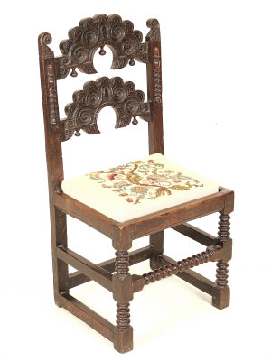 Appraisal: A South Derbyshire oak chair th century the shaped back