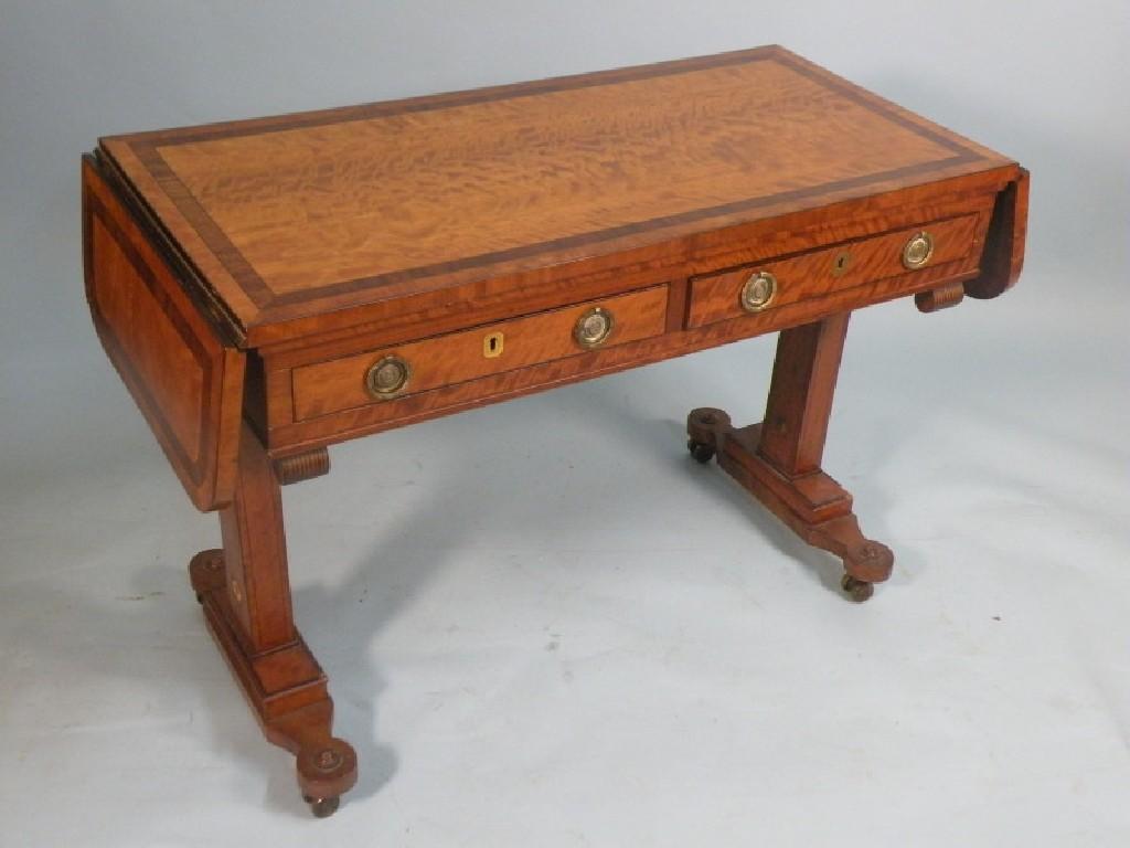 Appraisal: A thC satinwood and ebony strung sofa table the mahogany