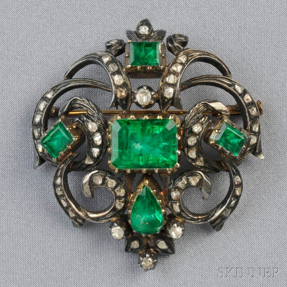 Appraisal: Emerald and Diamond Pendant Brooch set with an emerald-cut emerald