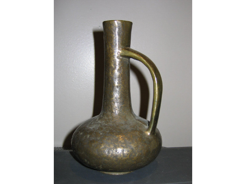 Appraisal: BRONZE EWER with flattened globular base elongated neck with handle