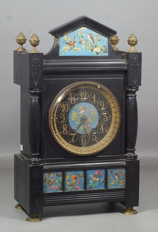 Appraisal: Incise carved black slate French mantle clock set with enameled