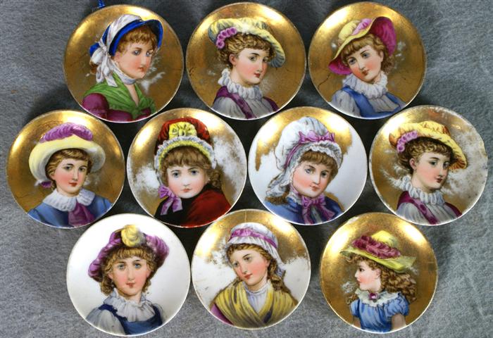 Appraisal: European porcelain portrait butter pats all young girls in hats