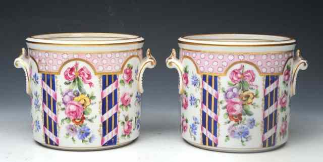 Appraisal: A PAIR OF FRENCH CACHE POTS each painted with roses