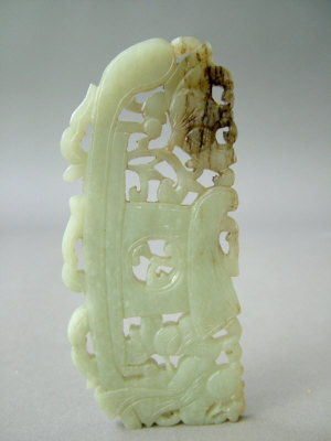 Appraisal: A Chinese celadon jade plaque carved as a figure in