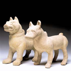 Appraisal: PAIR HAN POTTERY DOGS Pair large well formed Chinese Han