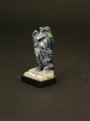 Appraisal: A Martin Brothers stoneware bird by Robert Wallace Martin webbed