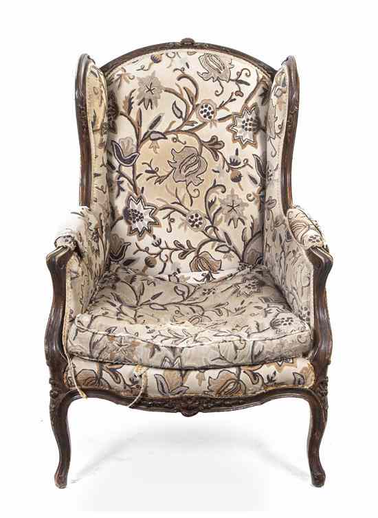 Appraisal: A Louis XV Style Carved Bergere a Oreilles having an