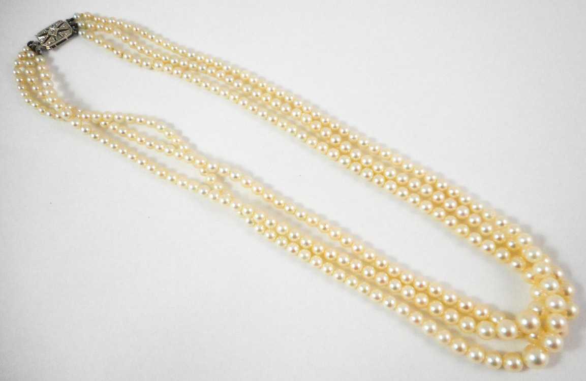 Appraisal: PRINCESS LENGTH TRIPLE STRAND PEARL NECKLACE measuring inches in length