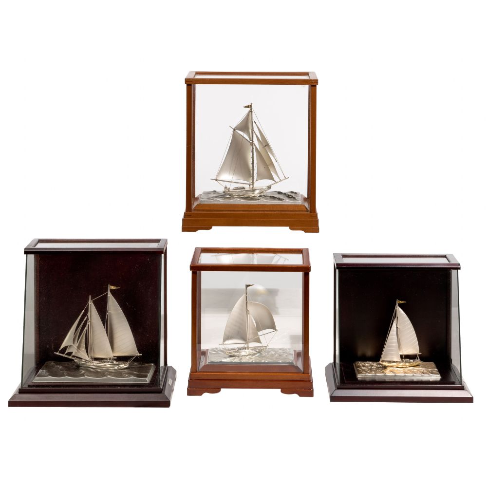 Appraisal: TAKEHIKO STERLING SILVER SAILBOAT ASSORTMENT items having gilt flags and