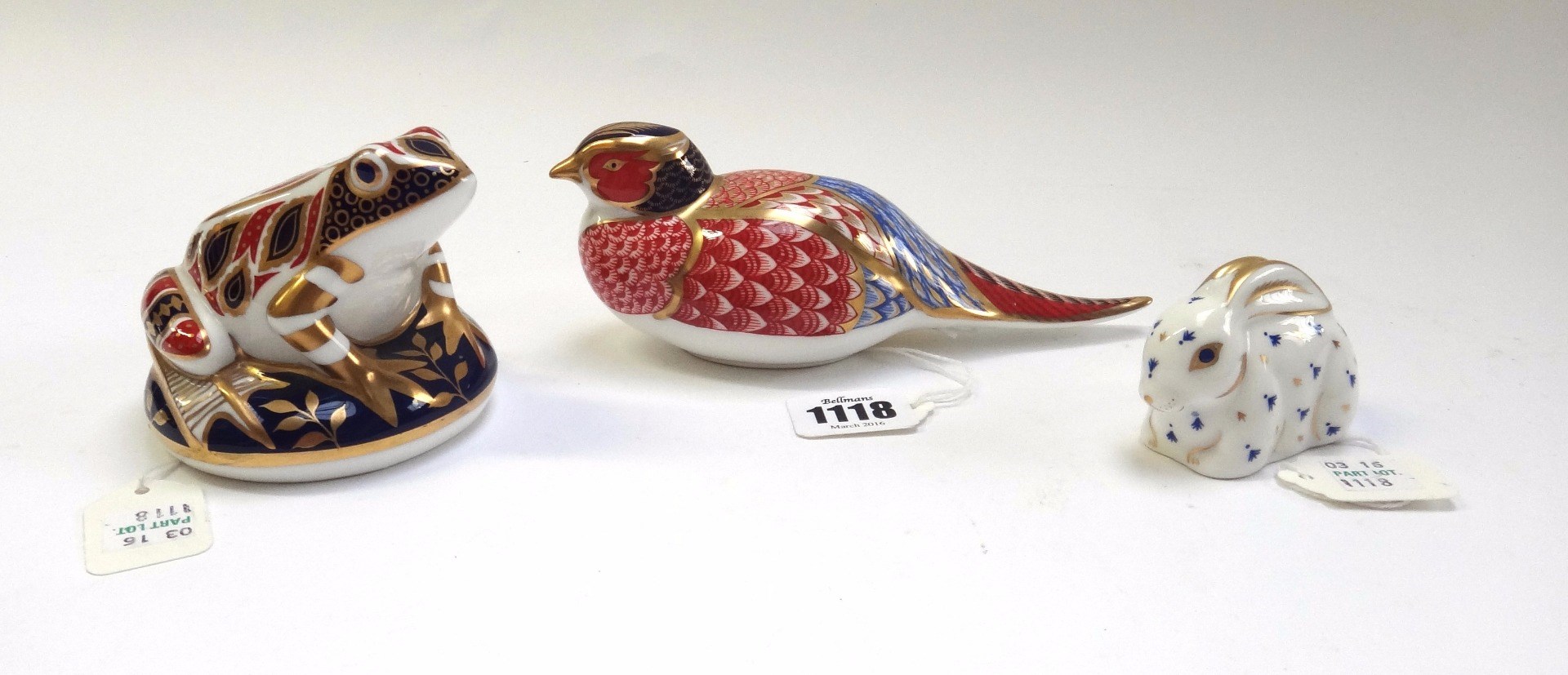 Appraisal: Two Royal Crown Derby porcelain paperweights a pheasant and a