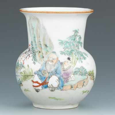 Appraisal: A Small Porcelain Vase with Figure Porcelain vase with swelled