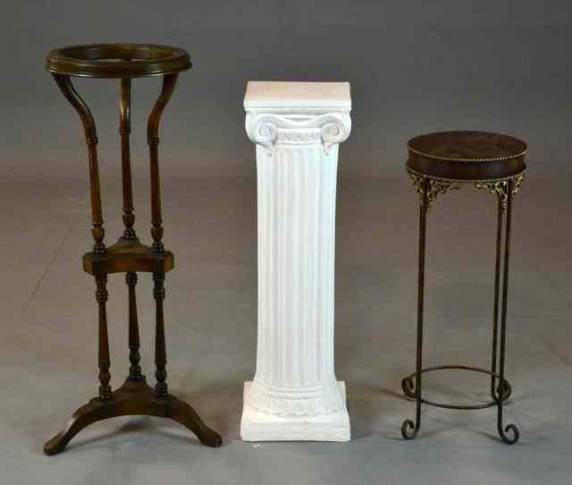 Appraisal: Decorative Pedestal StandsTo include white plaster pedestal a painted wrought