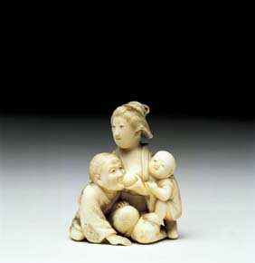 Appraisal: ANTIQUE IVORY NETSUKE Antique carved ivory netsuke of a woman