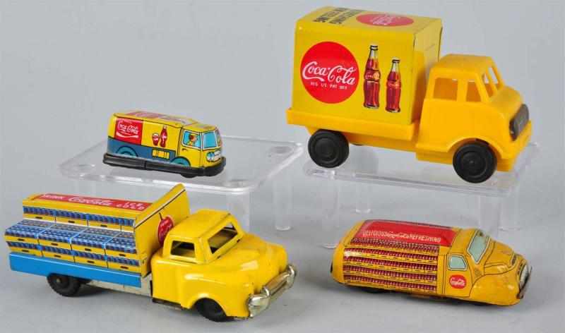 Appraisal: Lot of Assorted Coca-Cola Truck Toys Description Circa s to