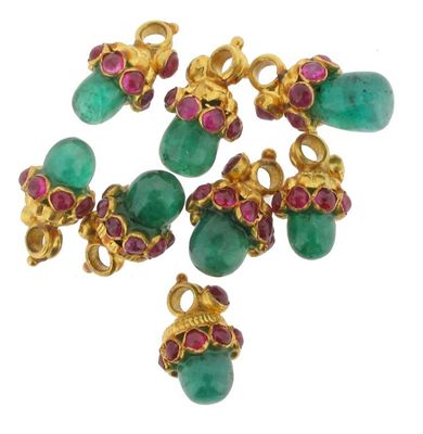 Appraisal: Eight Indian graduated pendants set with cabochon emeralds and rubies