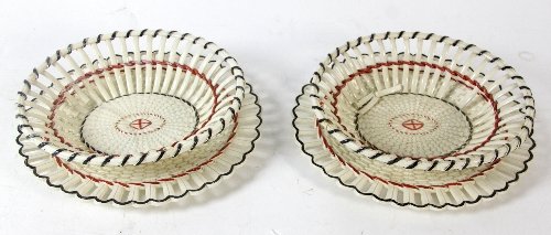 Appraisal: A pair of Wedgwood baskets and stands of cream woven