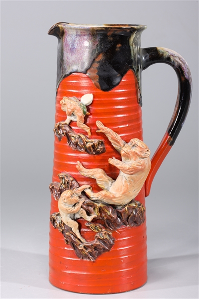 Appraisal: Japanese Sumidagawa pitcher featuring monkeys with blue and white seal