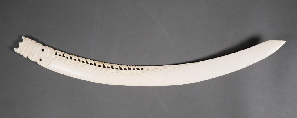 Appraisal: Old carved ivory tusk in the shape of a sword