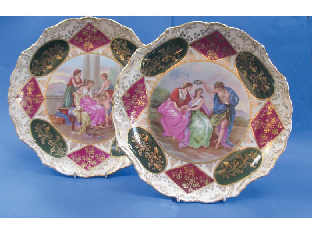 Appraisal: A PAIR OF VIENNA STYLE DISHES with circular vignettes to