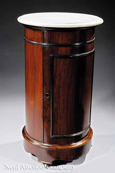 Appraisal: An American Rosewood and White Marble Cylinder Commode in the