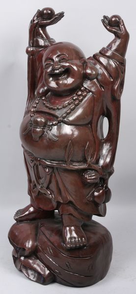 Appraisal: Finely carved mahogany Buddha h x w d EST