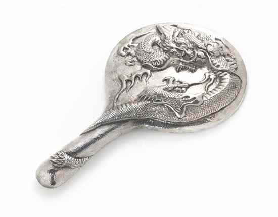 Appraisal: A Japanese Export Silver Hand Mirror of round handled form