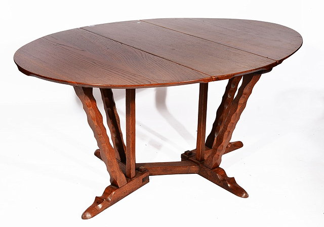 Appraisal: AN EARLY TH CENTURY OAK GATELEG TABLE attributed to Arthur