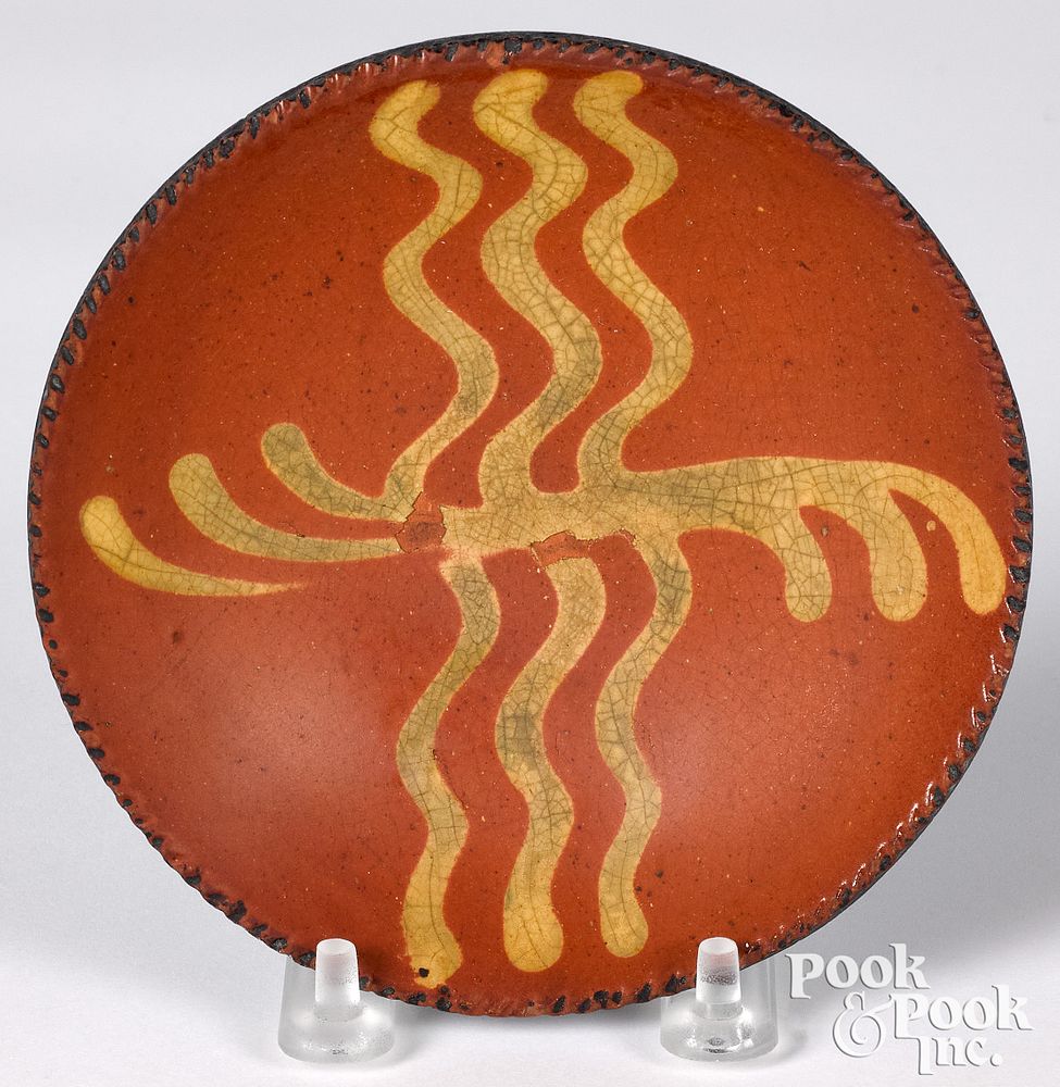 Appraisal: Miniature Pennsylvania redware plate th c Miniature Pennsylvania redware plate