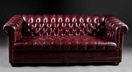 Appraisal: Button upholstered leather Chesterfield sofa th century in H in