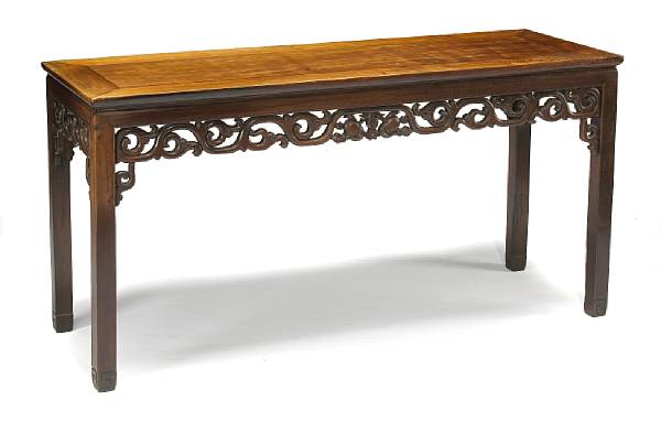 Appraisal: A hardwood long side table with reticulated aprons Late Qing