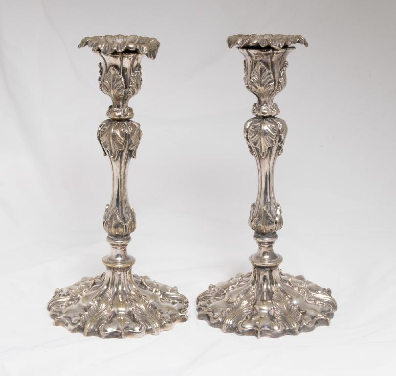 Appraisal: PAIR OF ROCOCO REVIVAL SILVER-PLATED CANDLESTICKS th CENTURY with detachable