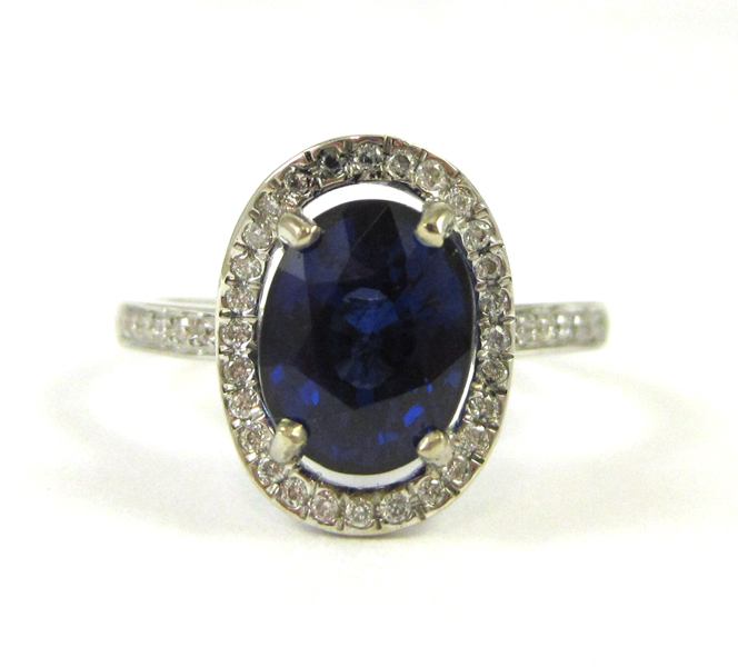 Appraisal: SAPPHIRE DIAMOND AND FOURTEEN KARAT GOLD RING The white gold