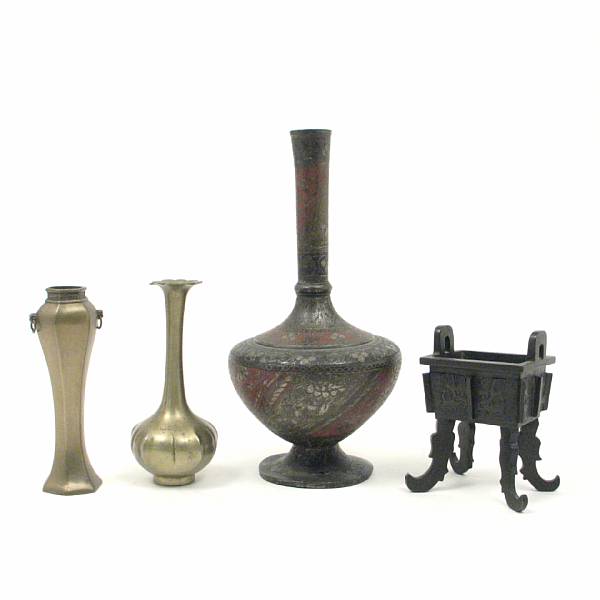 Appraisal: A group of Japanese Chinese and Indian metal work bases