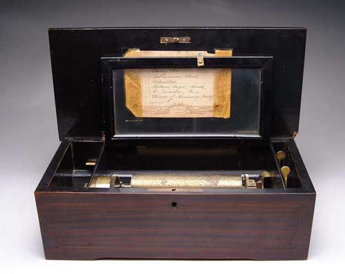 Appraisal: SIX TUNE SWISS MUSIC BOX IN INLAID ROSEWOOD CASE Hinged