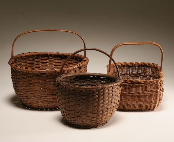 Appraisal: Three hand woven handled splint baskets two early round ash