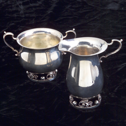 Appraisal: Walter Meyer sterling sugar and creamer flower and leaf motif